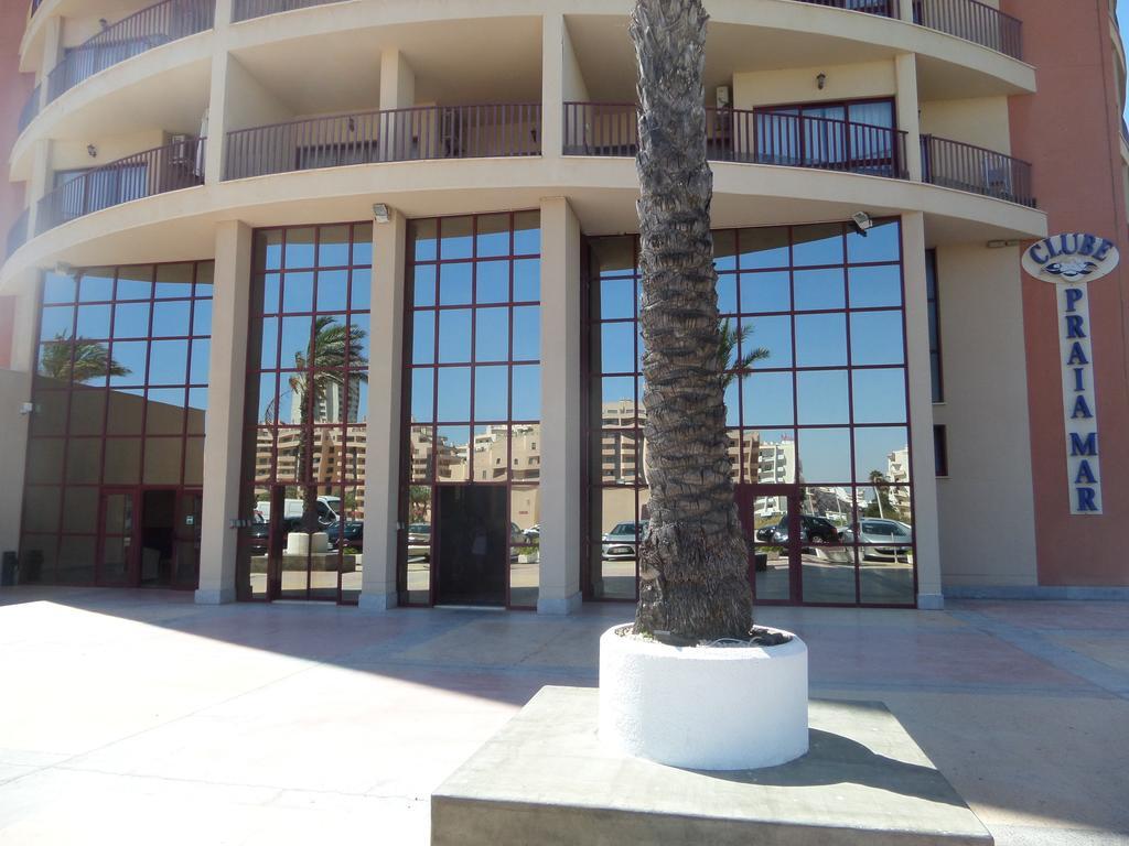 Praia Mar Portimao Bilik gambar